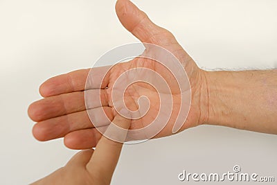 closeup of male hand of adult mature man in gesture fingers holding, palm reading, shows, open palm on white background, concept Stock Photo