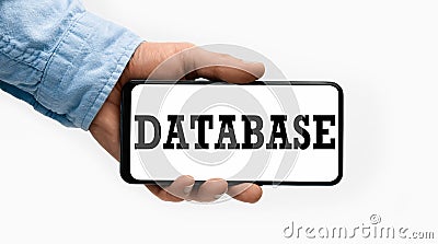 Closeup of a male hand holding Smartphone with word Database on display Stock Photo