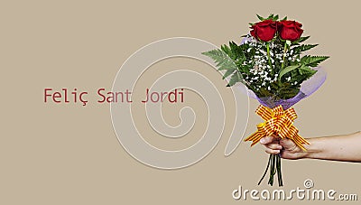 Roses and text happy Saint George Day in Catalan Stock Photo