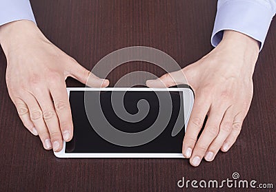 Closeup of man's hands with tablet computer. Stock Photo