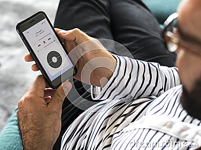 Closeup of a man streaming music Stock Photo