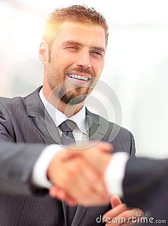 Closeup . the Manager shakes hands with the client Stock Photo