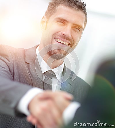 Closeup .the Manager shakes hands with the client Stock Photo