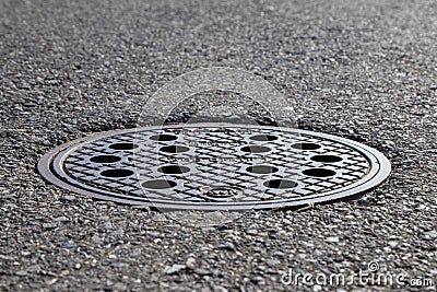 Closeup of a manhole cover Stock Photo