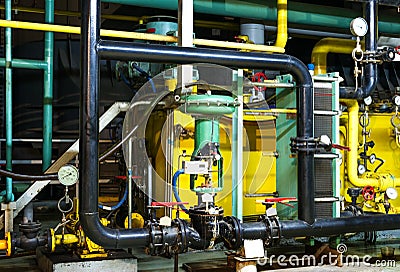 Closeup of manometer, pipes and faucet valves of heating system Stock Photo