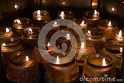 Closeup of many burning candles Stock Photo