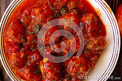 Closeup Meatballs in sweet and sour tomato sauce. Top view Stock Photo