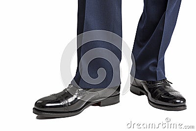 Closeup of Men's Stylish Semi-Brogue Oxford Shoes on a Standing Stock Photo
