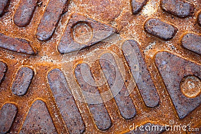 Closeup of the metal manhole cover surface Stock Photo