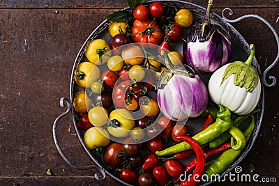 Closeup of metallic basket with fresh vegetables Stock Photo