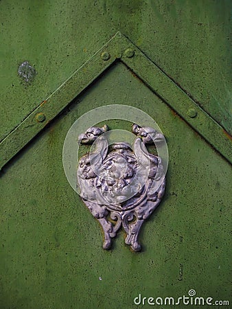 Closeup of metallic ornament with lion and griffons Stock Photo