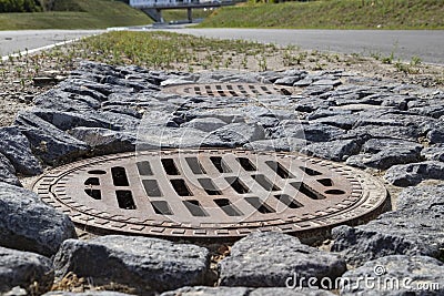 Closeup of a new manhole cover Stock Photo