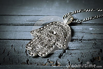 Old hamsa amulet or hand of fatima Stock Photo