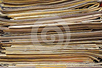 Closeup of old newspapers and magazines, stack, side view Stock Photo