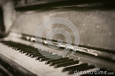 Closeup of old vintage scratched piano in monochrome - retro photography Stock Photo