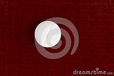 Closeup of one white pills Stock Photo