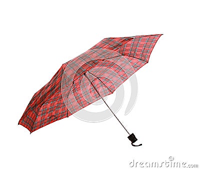 Closeup on an opened red checkered umbrella with a black ending on a white background Stock Photo