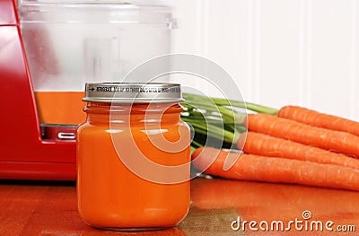 Closeup organic carrot baby food Stock Photo