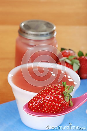 Closeup organic strawberry baby food concept Stock Photo