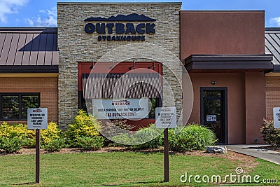 Closeup of an Outback Steakhouse Storefront Editorial Stock Photo