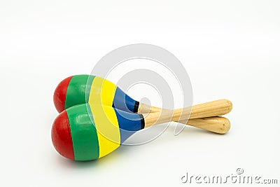 A pair of colorful maracas lying on a white underground Stock Photo