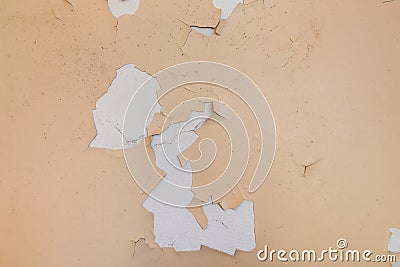 Closeup pale color and peeling of painted pink cement wall texture background Stock Photo