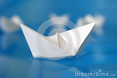 Closeup of paper origami boat Stock Photo