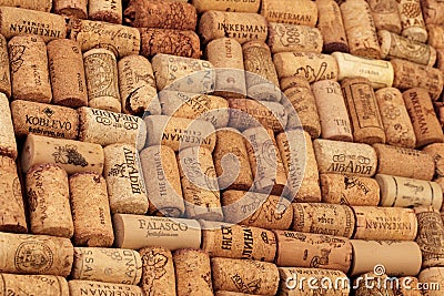 Closeup pattern background of many different wine corks with dates and drops of wine - Image Editorial Stock Photo