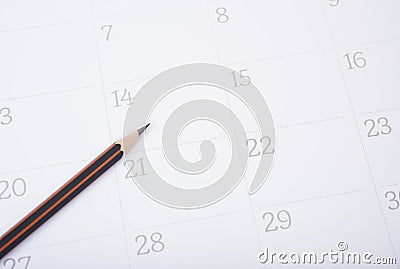 Closeup pencil on calendar. organization management remind Stock Photo