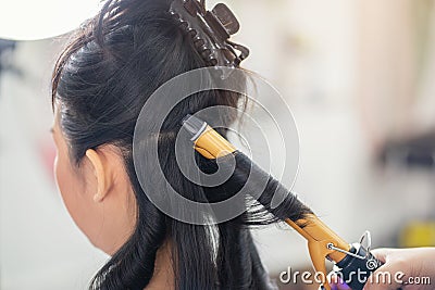 Closeup people hairdresser coiffeur makes hairstyle at haircut shop, Hair care in modern spa salon Stock Photo