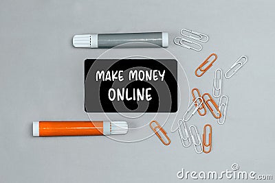 Closeup of a personal agenda with words - Make Money Online - written on a business card with a felt-tip pen Stock Photo