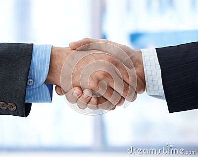 Closeup photo of business handshake Stock Photo