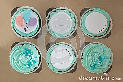Closeup photo of colorful cupcakes in paper box Stock Photo