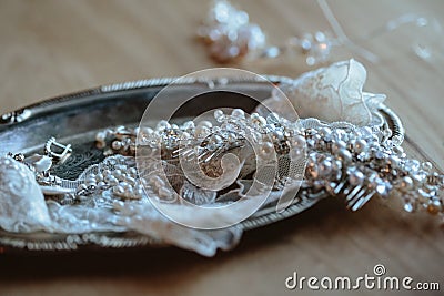 Closeup photo of details, workplace of decorator and creator of wedding imitation jewelry Stock Photo