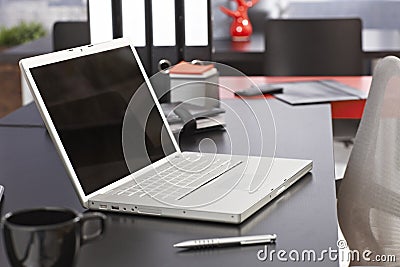 Closeup photo of laptop on desk Stock Photo