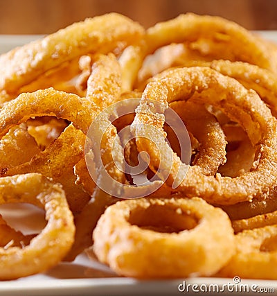 Closeup photo of a pile of onion rings Stock Photo