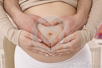 Closeup photo of pregnant tummy Stock Photo