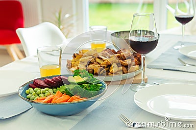 Closeup photo of served table with healthy vegetablesbowl and baked potato Stock Photo