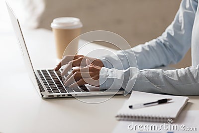 Closeup photo of woman hands typing on notebook at desktop Stock Photo