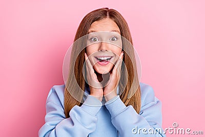 Closeup photo of young funny excited positive girl school learner student touch cheeks reaction face wow shocked Stock Photo