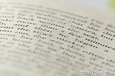 closeup phrase in English book with another words blurry Stock Photo