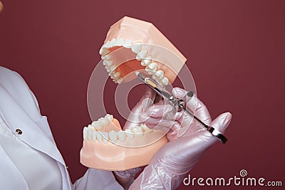 Closeup picture of showing prosess of making an anaesthesia in the jaw. Stock Photo