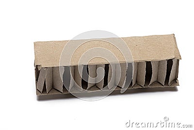 Closeup piece brown corrugated cardboard white background Stock Photo