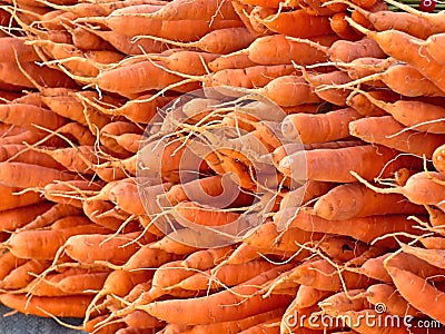 Pile of carrots for sale Stock Photo