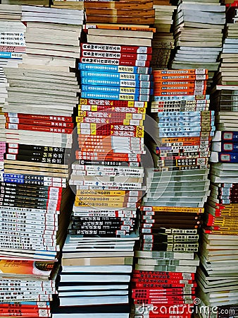 closeup of a pile of chinese books at a library in Wuhan city china Editorial Stock Photo