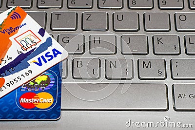 Closeup pile of credit cards, Visa payWawe and MasterCard, credit, debit Editorial Stock Photo