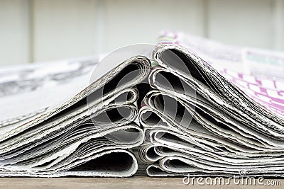 Closeup pile of newspaper Stock Photo
