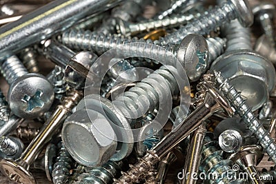 Closeup of pile of shiny screws Stock Photo