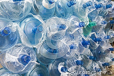 A closeup of a pile of used drinking water filling buckets Stock Photo