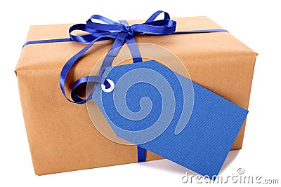 Closeup of plain brown paper package or parcel, blue gift tag or label isolated on white background Stock Photo